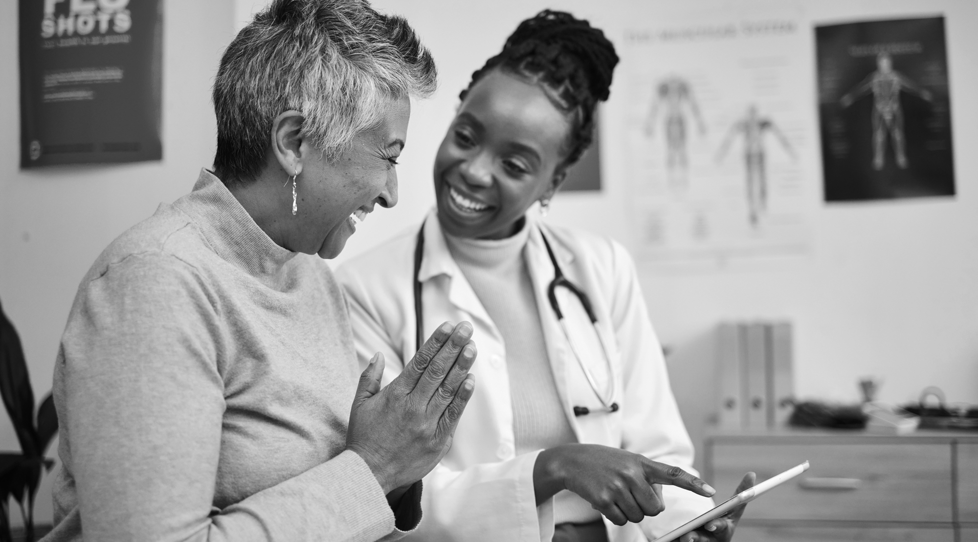 Medical professional meeting with patient.